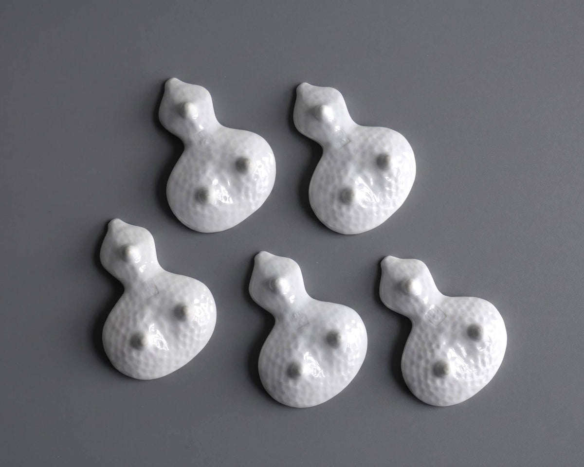 Floral Gourd Porcelain Chopstick Rest Set underside view showing three small support feet