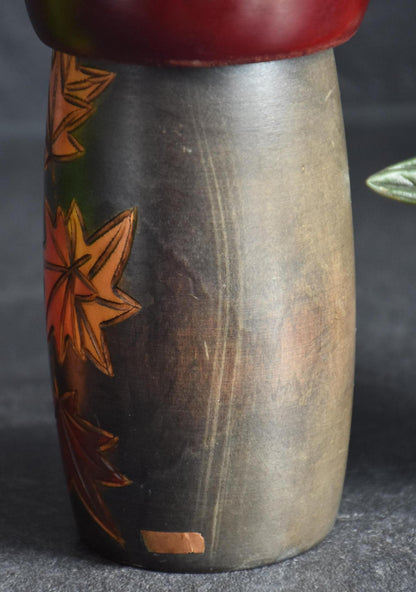 Kohji Sumiya kokeshi doll closeup of wood grain and texture on the back