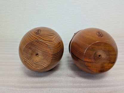 Yakusugi Cedar Sosaku Kokeshi Dolls With Sun Hats showing bases