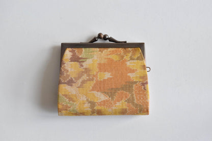 Oshima Tsumugi Silk Gamaguchi Coin Purse showing the textured pattern detail on the mud-dyed fabric