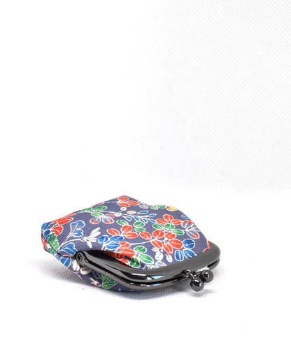 Kaga Yuzen Silk Gamaguchi Coin Purse angled profile showing the metal clasp and slim depth