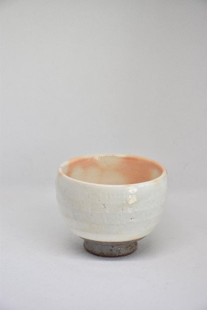 Set Of 5 White Kumidashi Teacups ceramic cup showing white glaze and orange interior coloring on white