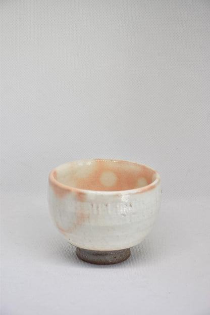 Set Of 5 White Kumidashi Teacups individual cup front view highlighting the textured ceramic surface