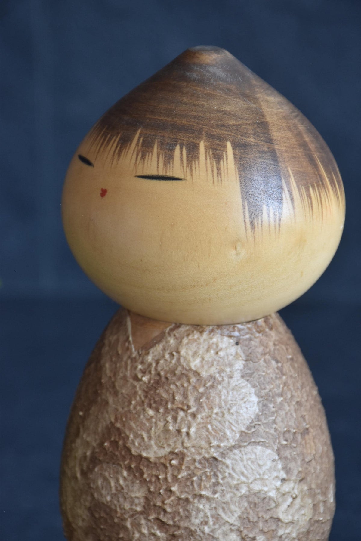 Masao Watanabe Sosaku Kokeshi Doll Mushin close up of handpainted face and pointed head top