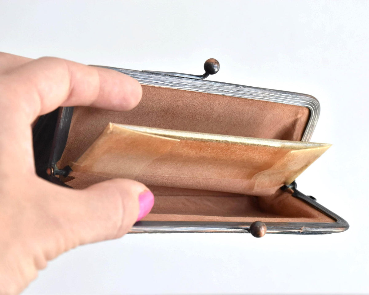 Blue Oshima Tsumugi Silk Gamaguchi Coin Purse interior view highlighting the compartments and fabric lining.