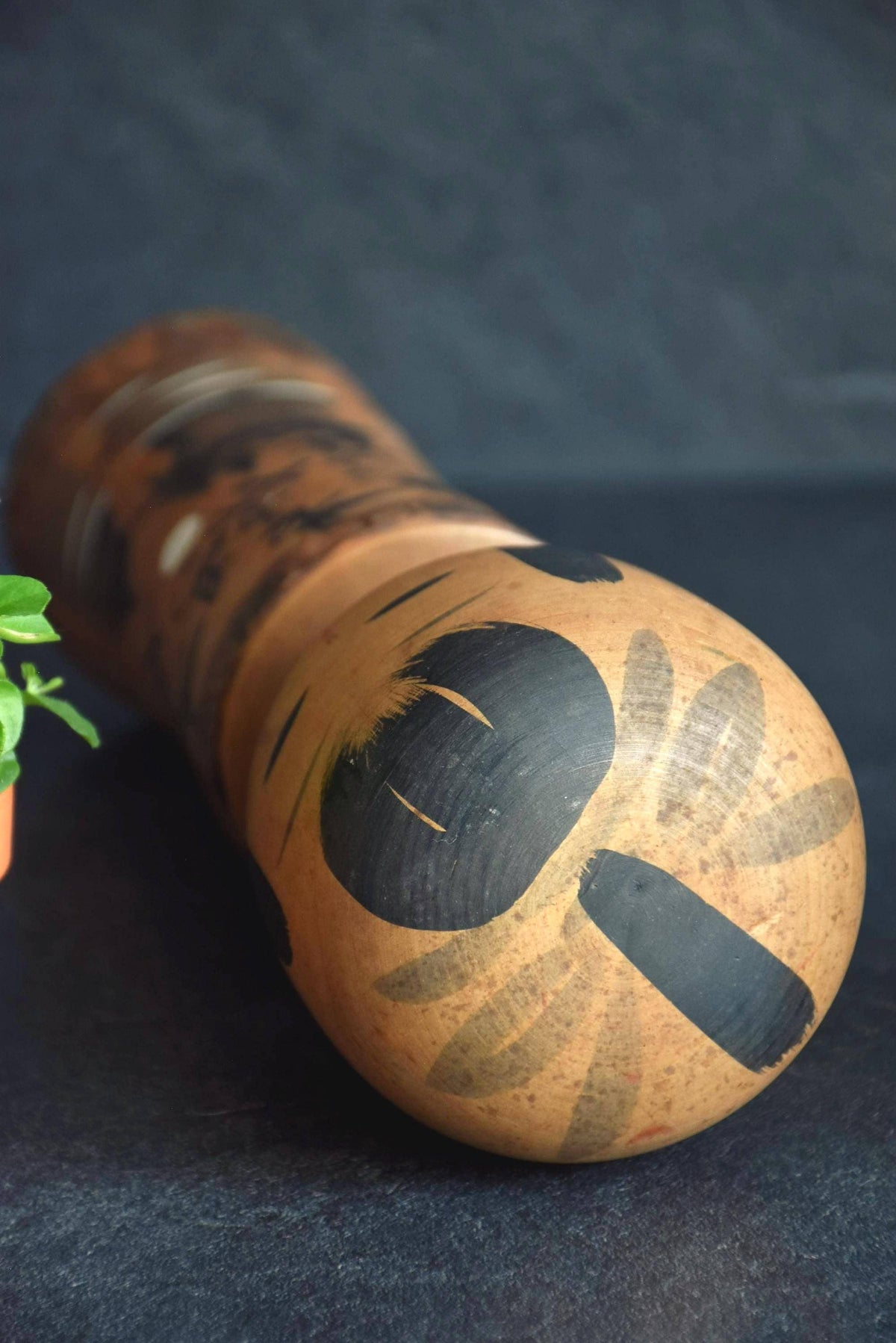Large Wooden Kokeshi Doll Landscape Calligraphy top-down view of the head and hair pattern