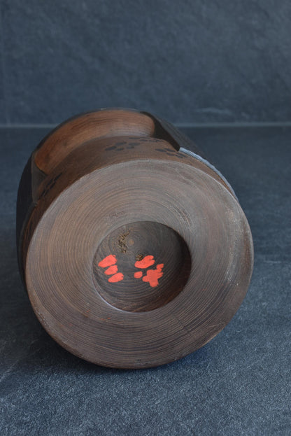 Sanpei Yamanaka kokeshi bottom base showing artist signature and recessed wood