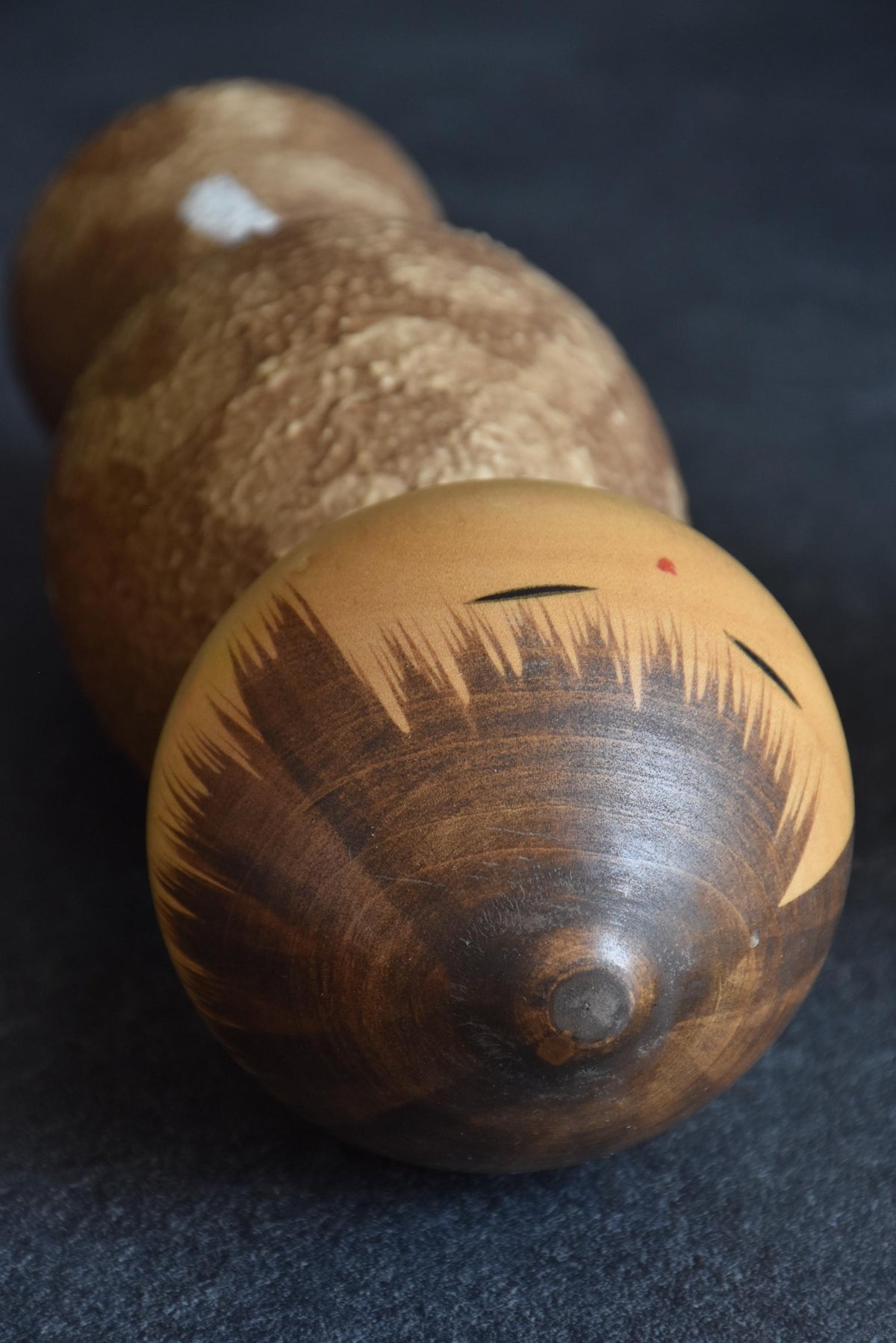 Masao Watanabe Sosaku Kokeshi Doll Mushin top down view focusing on head shape and hair painting