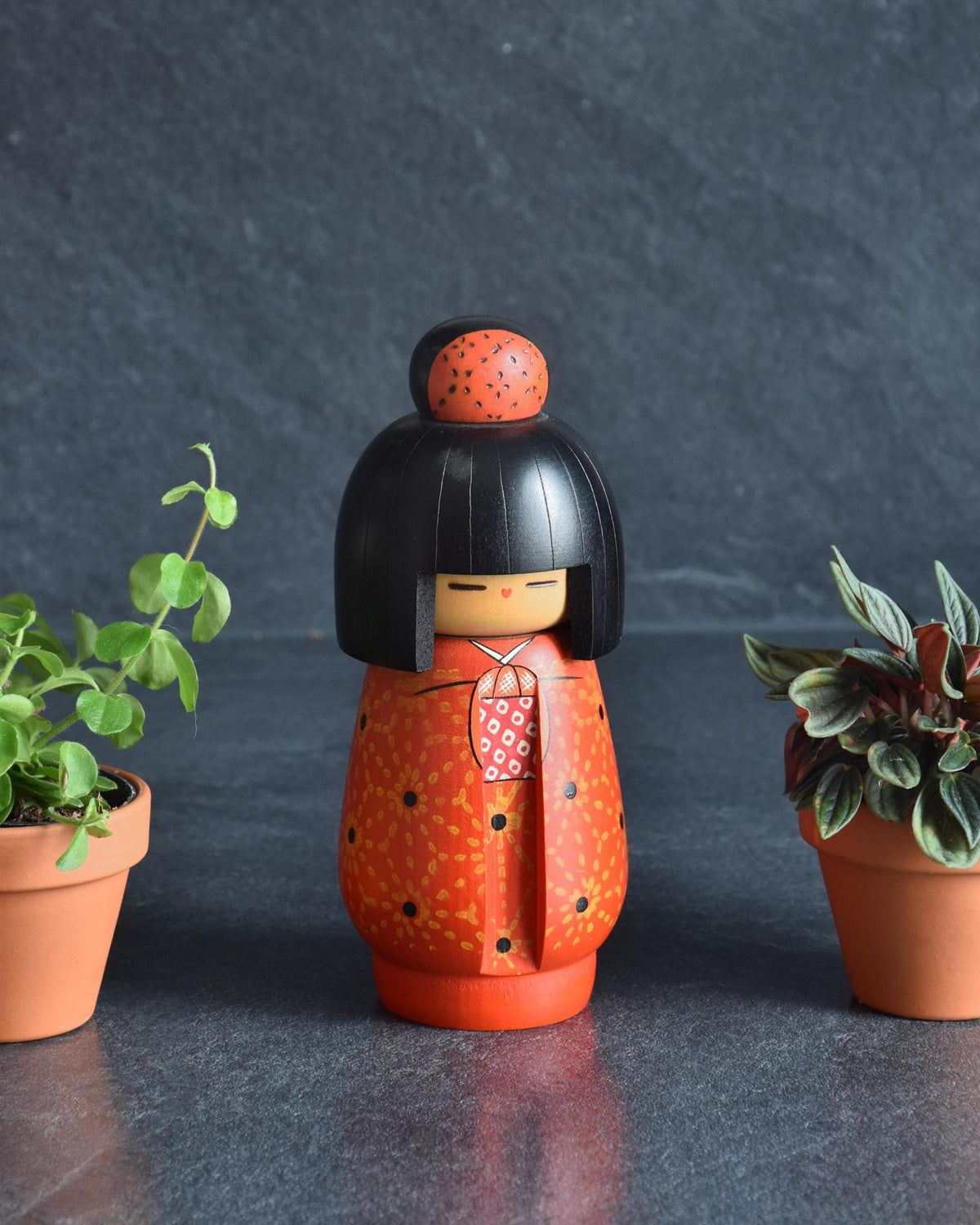 Kazuo Takamizawa Sosaku Kokeshi Doll Orange Kimono with hand-carved floral patterns
