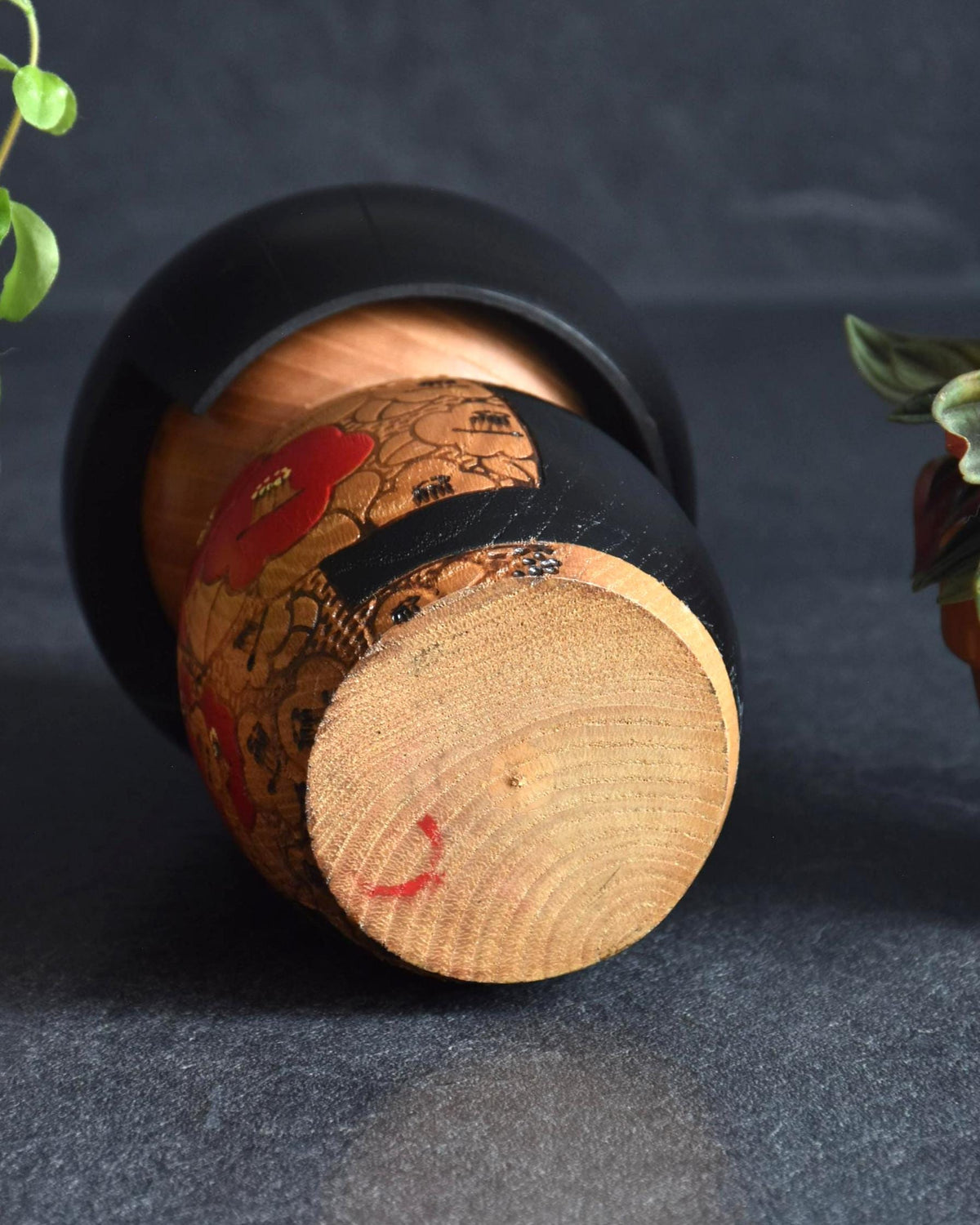 Kazuo Takamizawa kokeshi wooden base showing the natural wood grain and texture