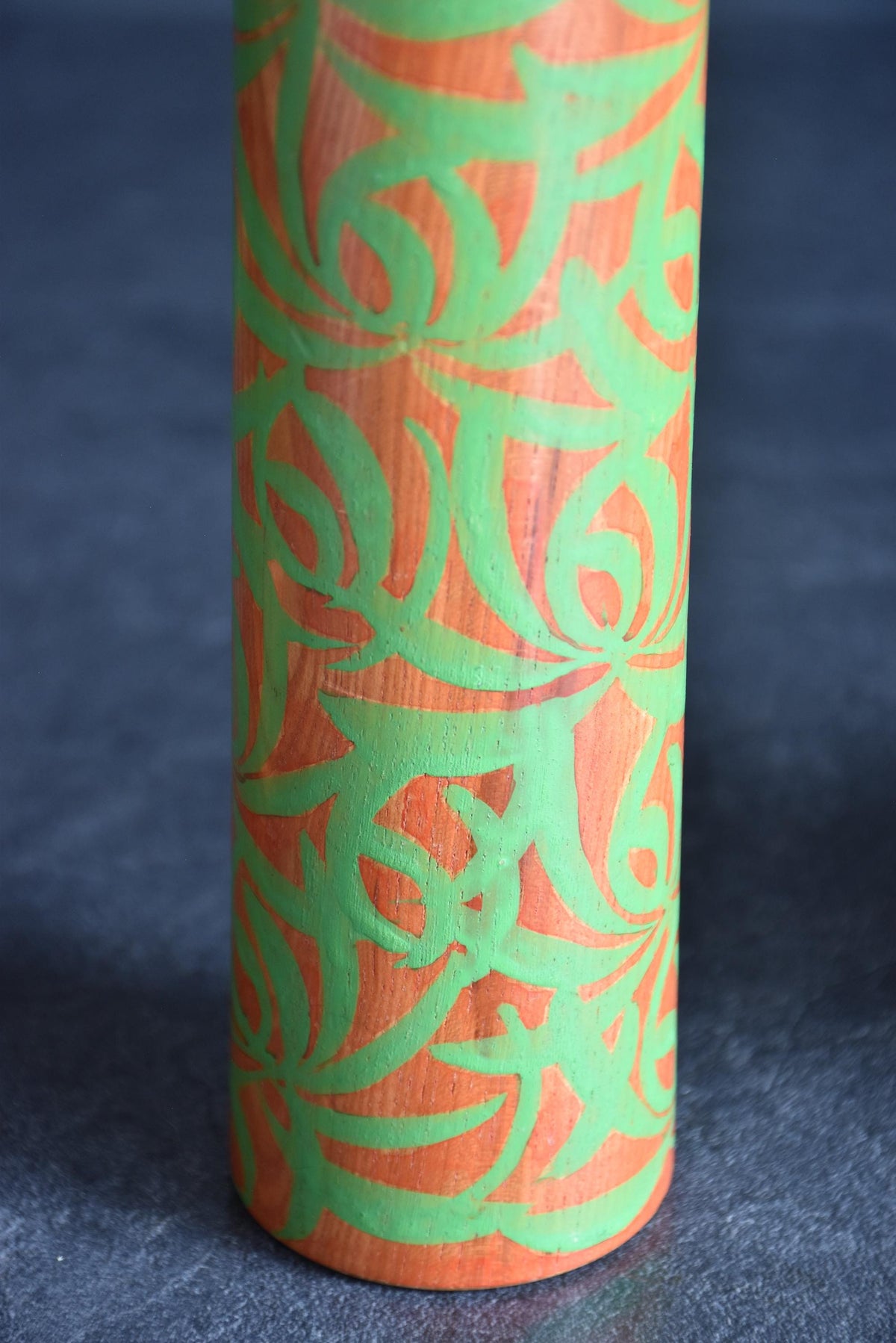 Issetsu Kuribayashi sosaku kokeshi doll showing lower body with hand painted floral detail