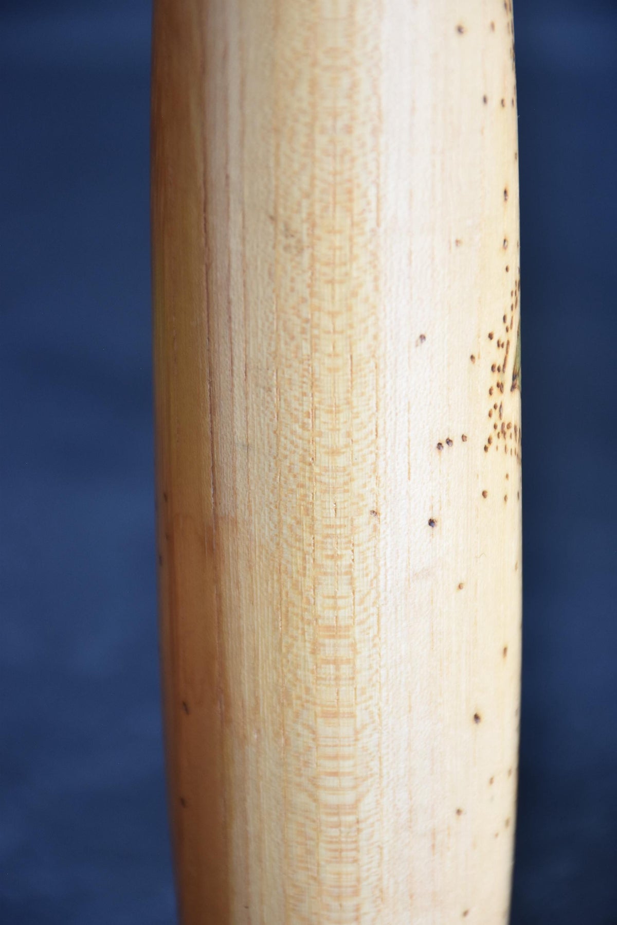 Kazuo Takamizawa sosaku kokeshi doll close up view of the natural wood grain texture