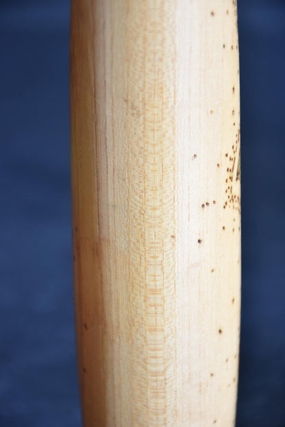 Kazuo Takamizawa sosaku kokeshi doll close up view of the natural wood grain texture
