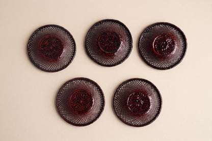 Floral Etched Glass And Rantai Shikki Bamboo Tea Set five lacquered bamboo coasters arranged on a flat surface