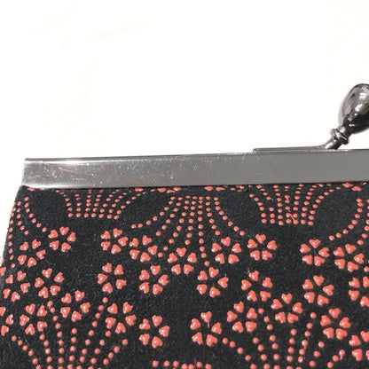 Inden Deerskin Gamaguchi Coin Purse detail of the metal frame and stenciled lacquer pattern