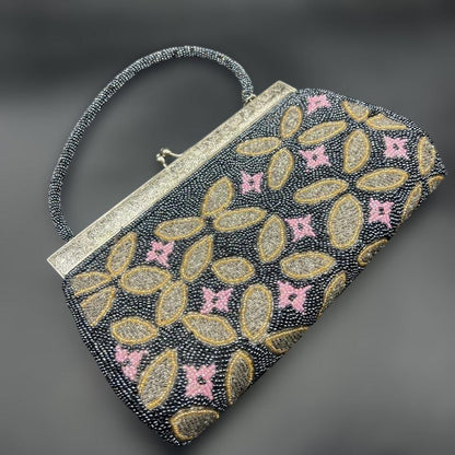 Japanese beaded handbag shown from an upper angle highlighting the geometric pattern