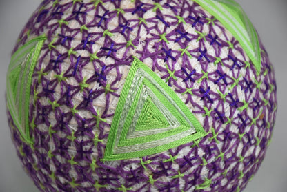 Hand-Embroidered Japanese Temari Ball Folk Art pattern detail close up of green and purple embroidery.