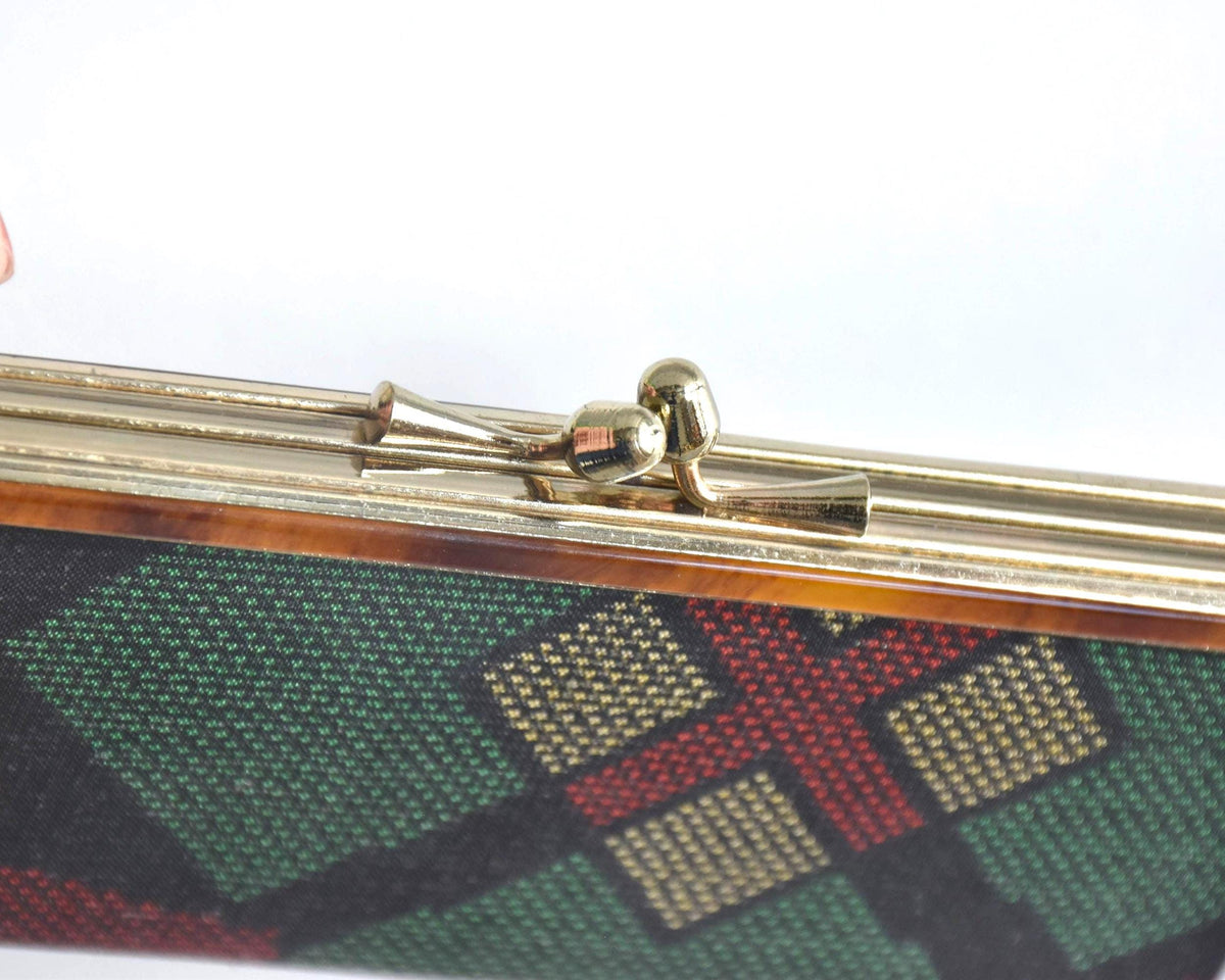 Green Oshima Tsumugi Silk Gamaguchi Coin Purse close-up of the metal gamaguchi clasp.