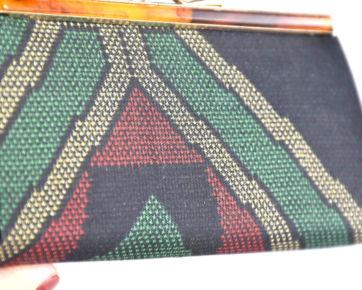 Green Oshima Tsumugi Silk Gamaguchi Coin Purse close-up of the back textile pattern.