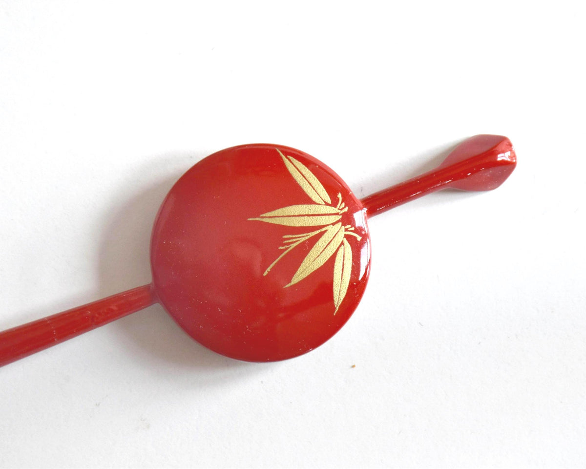 Red Lacquer Kanzashi Set: Origami Crane And Peony hair accessory showing reverse bamboo leaves motif