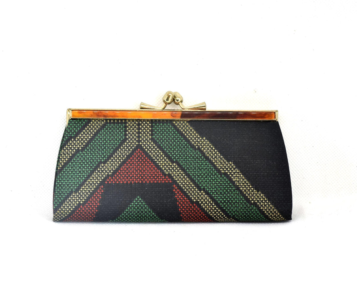 Green Oshima Tsumugi Silk Gamaguchi Coin Purse showing the back pattern and metal frame.