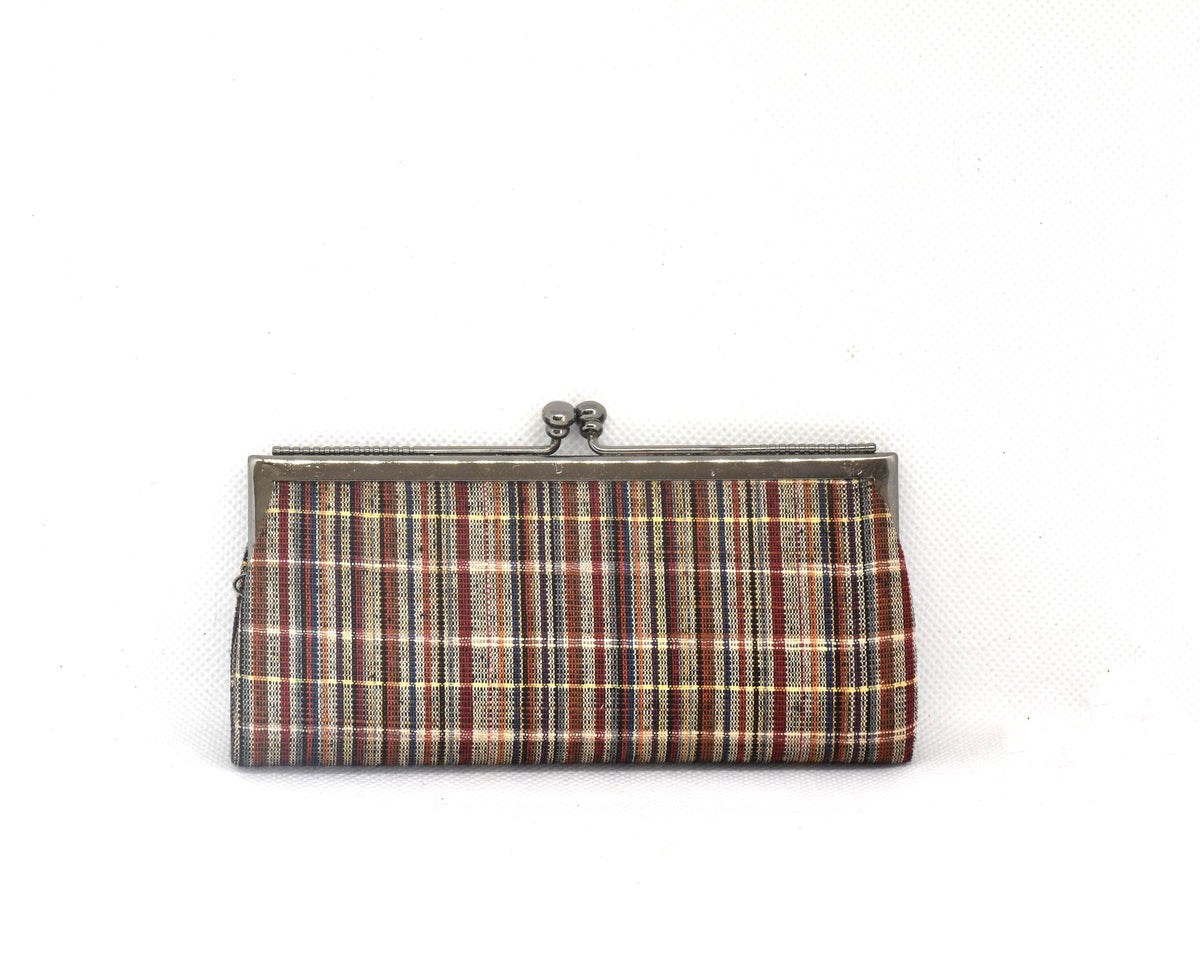 Ueda Tsumugi silk coin purse shown horizontally centered in a straight front view