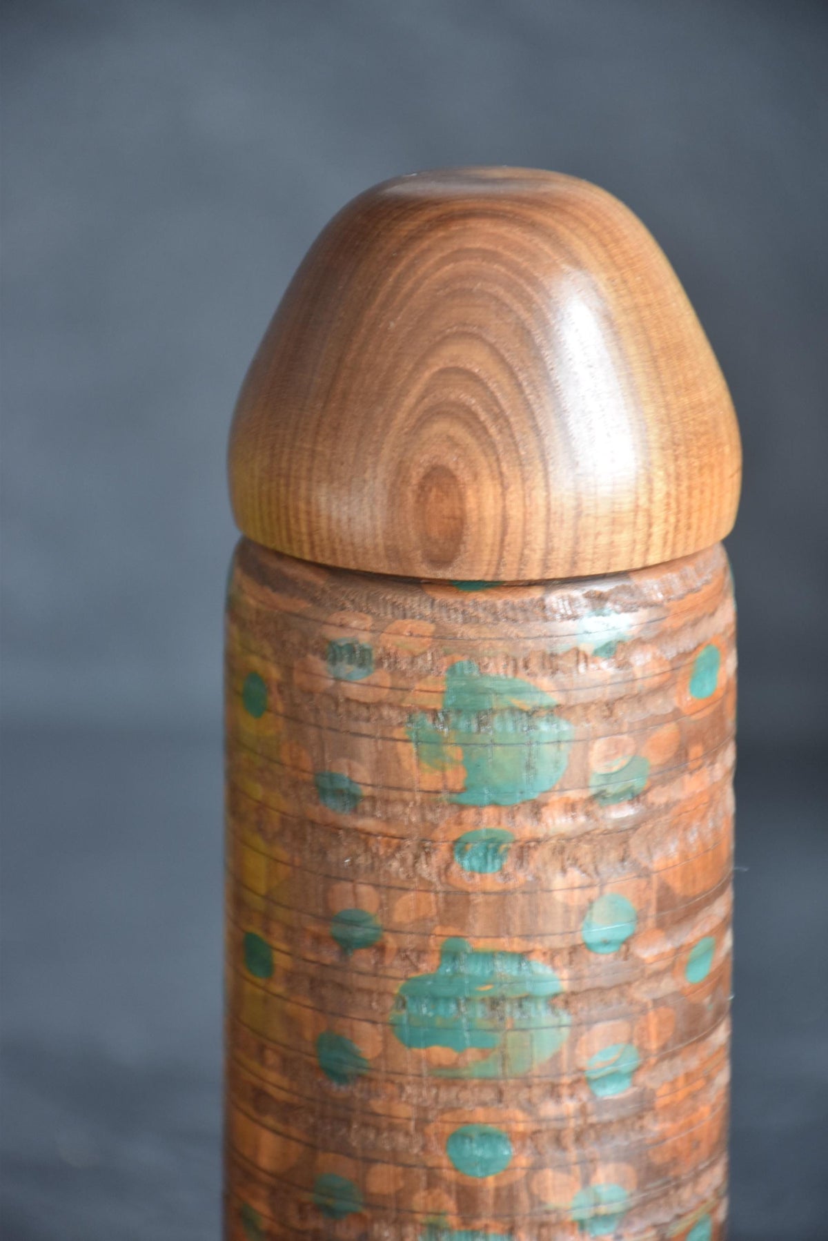 Miyajima Muhitsu kokeshi doll painted dot pattern closeup