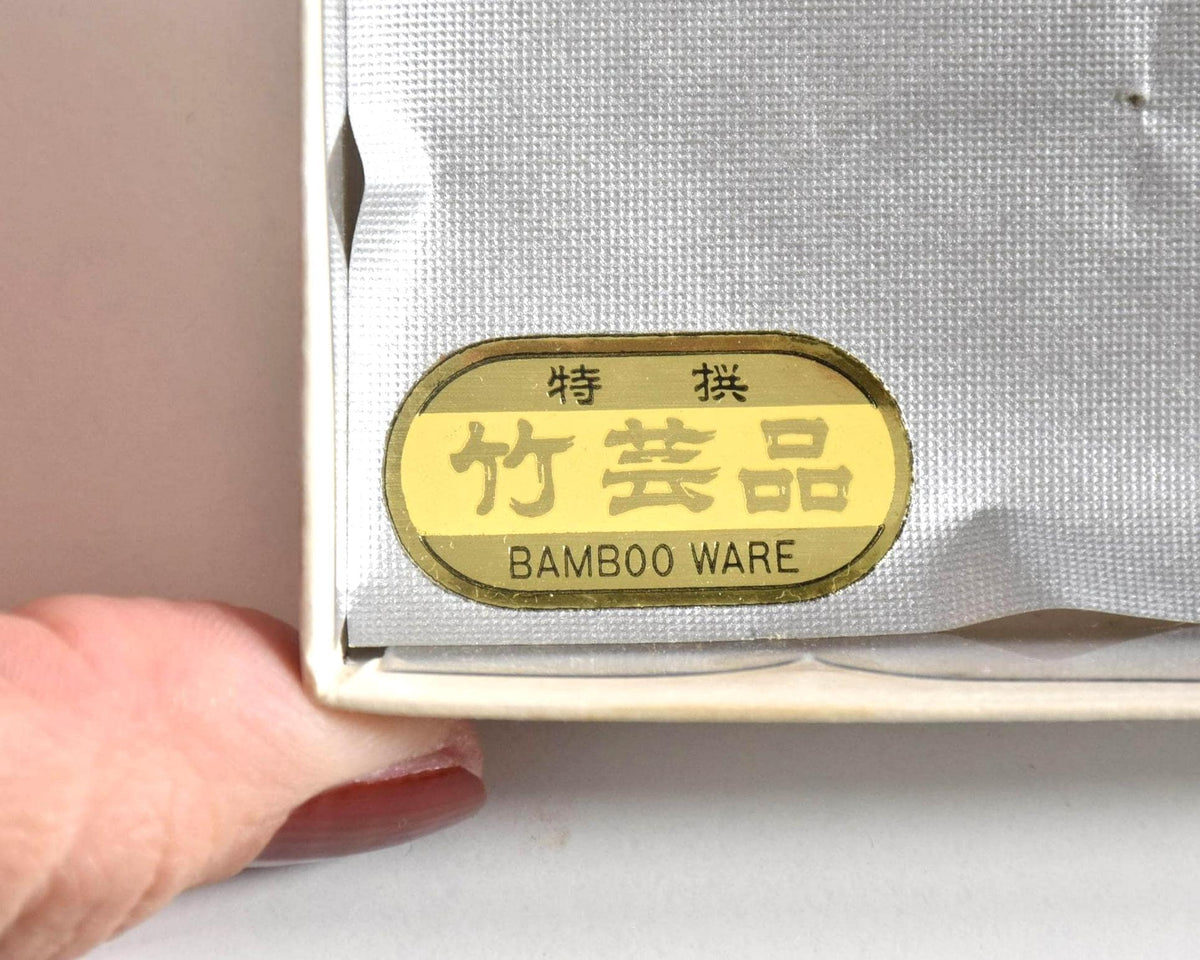 Hand-Woven Bamboo Knot Brooch In Beige And Green label inside the box