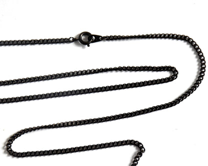 Ainu hand-carved wooden floral medallion necklace dark gunmetal curb chain clasp