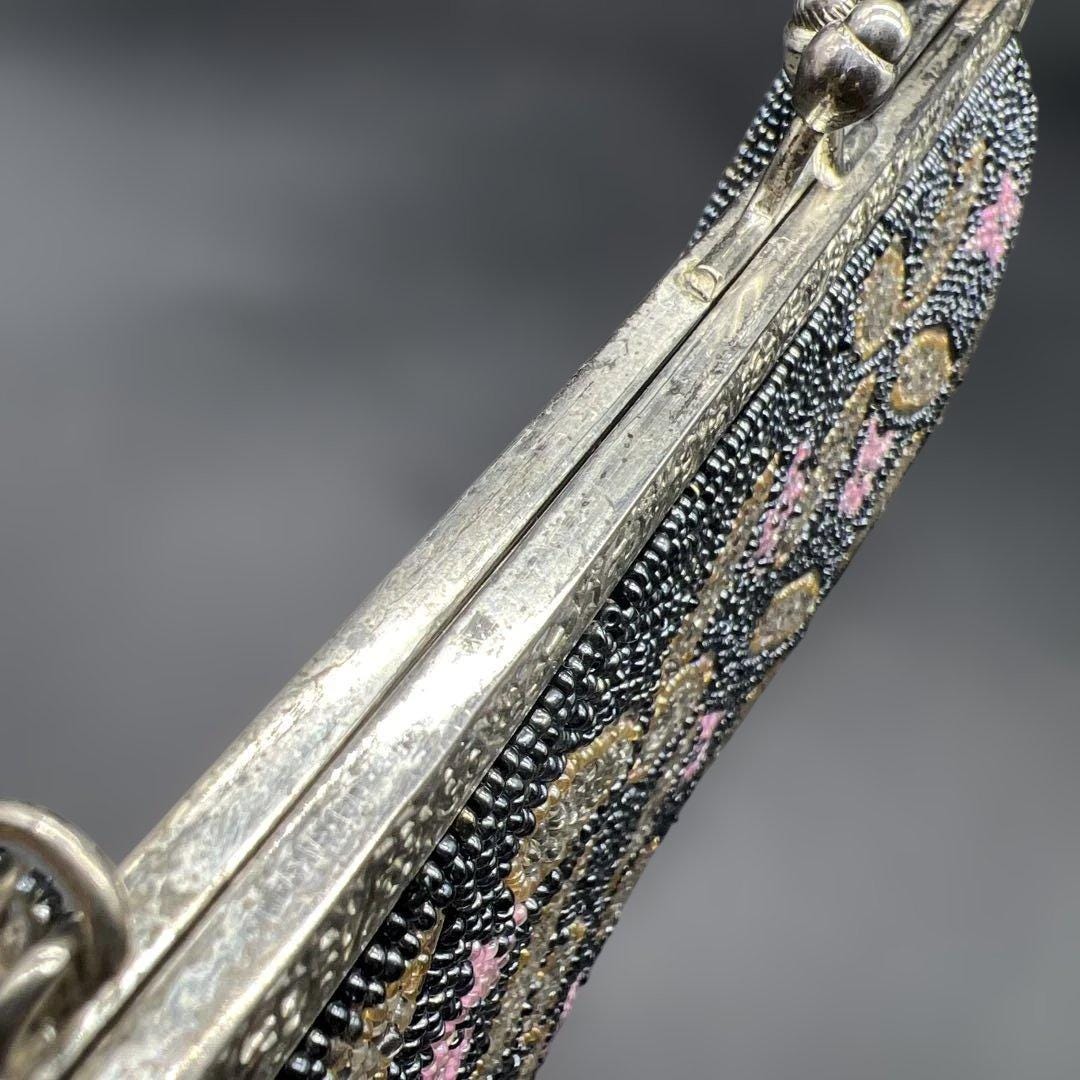 Japanese beaded clutch with geometric floral pattern showing clasp hardware detail