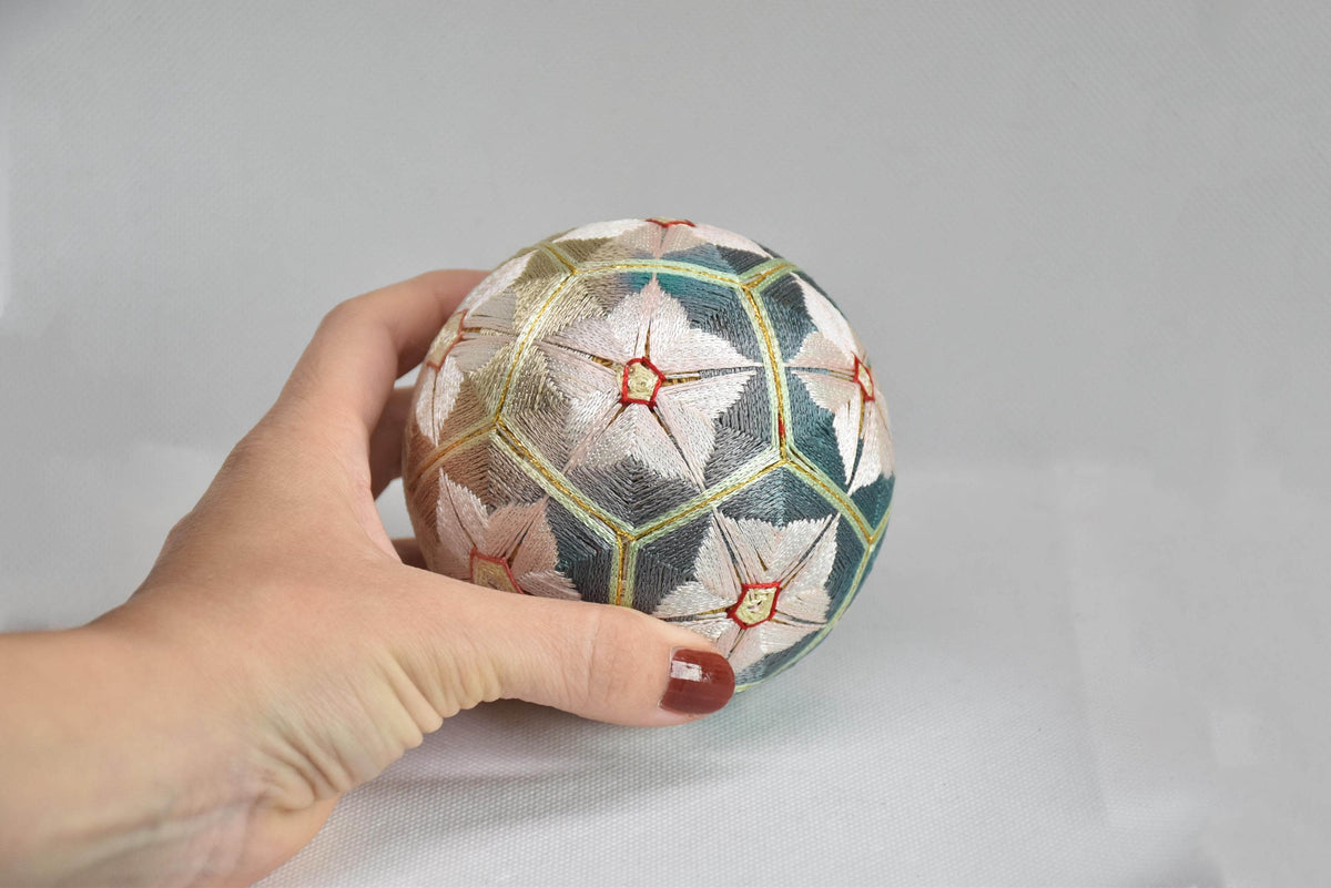 Hand-Embroidered Japanese Temari Folk Art Ball table scatters shown next to a hand for size