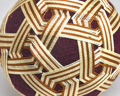 Hand-Embroidered Japanese Temari Ball Folk Art close up of the intricate hand-stitched thread geometry