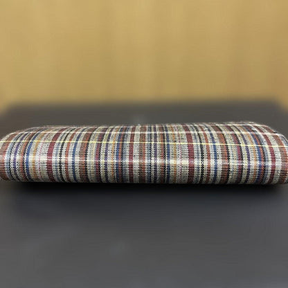 Ueda Tsumugi silk coin purse viewed from the back showing continuous striped textile