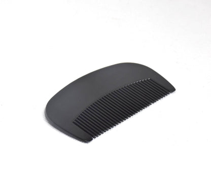 Japanese Black Lacquer Kushi Comb showing back view of the black lacquered hair accessory