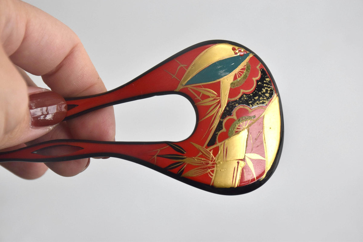 Red Lacquer Fan Kanzashi hair accessories, size comparison held in a hand from another angle