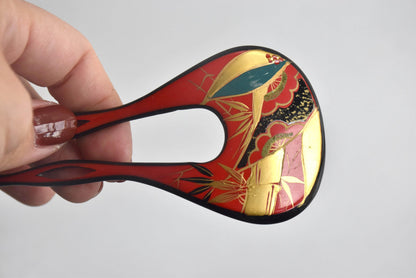 Red Lacquer Fan Kanzashi hair accessories, size comparison held in a hand from another angle