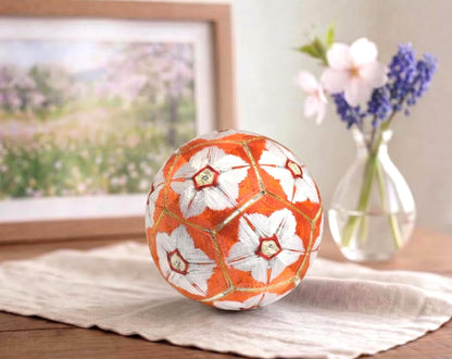 Hand-Embroidered Japanese Temari Ball Folk Art displayed as table scatters near a flower vase