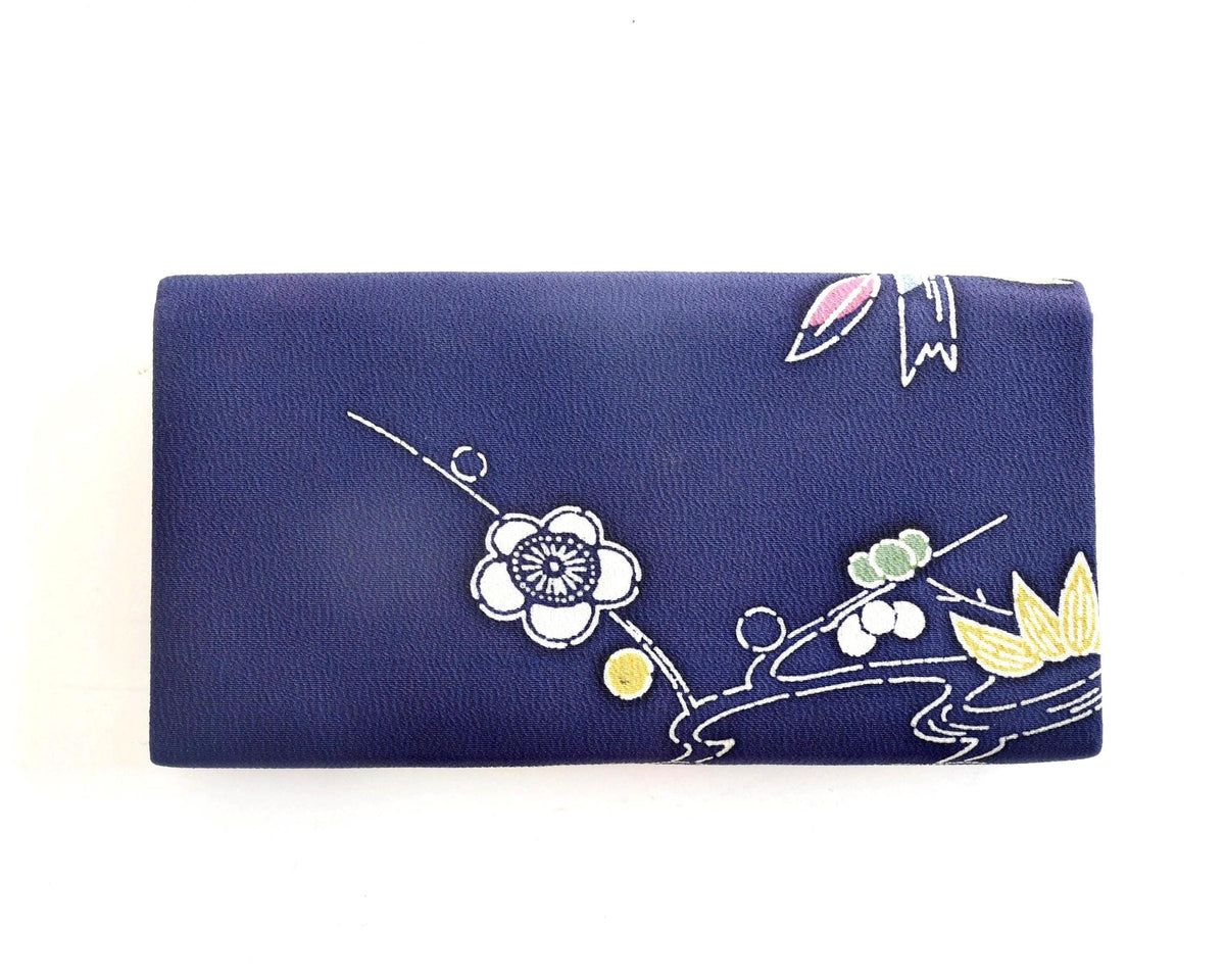 Navy Chirimen Kimono Clutch With Tsuru Crane Motif showing back side with plum blossom pattern