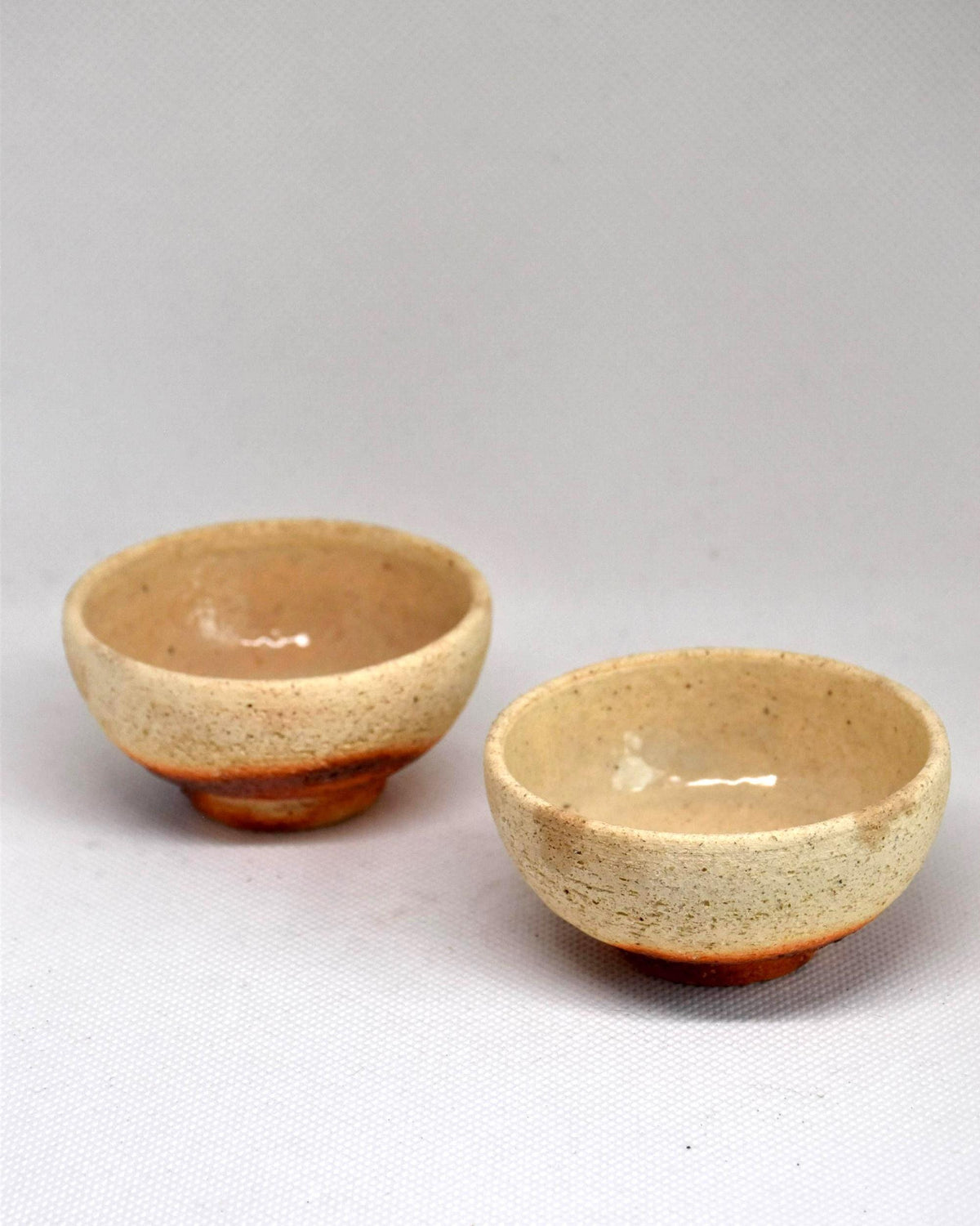 Ochre And Reddish-Brown Ceramic Sake Cup Pair side profile