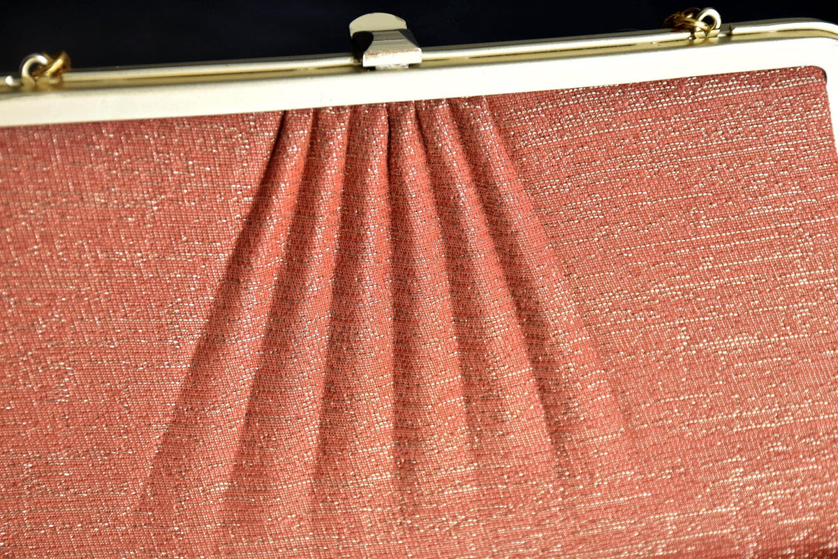 Floral Woven Kimono Clutch detail of the pleated pink textured fabric near the frame