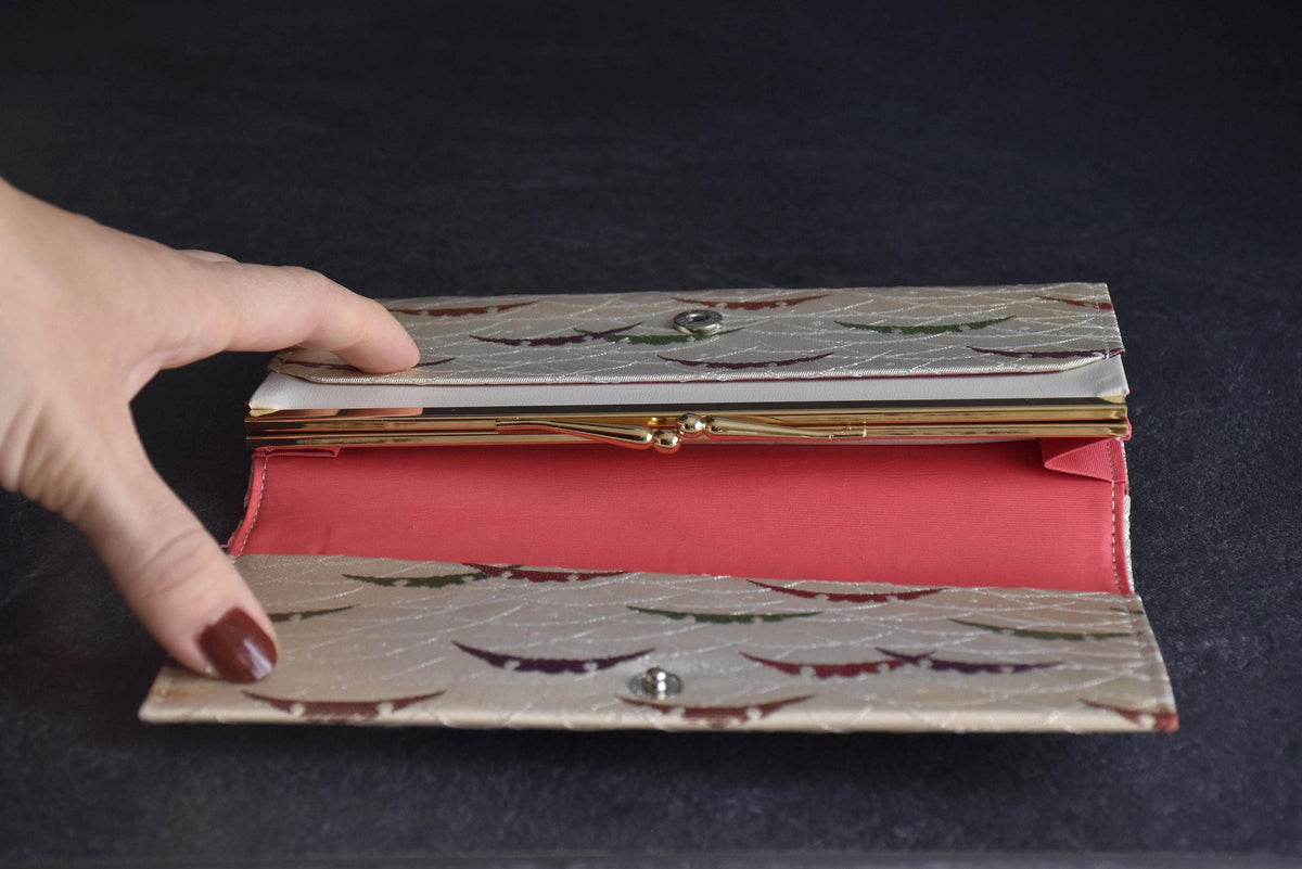 Shiseido Japanese Kimono Clutch With Traditional Weaves open view with kiss lock frame
