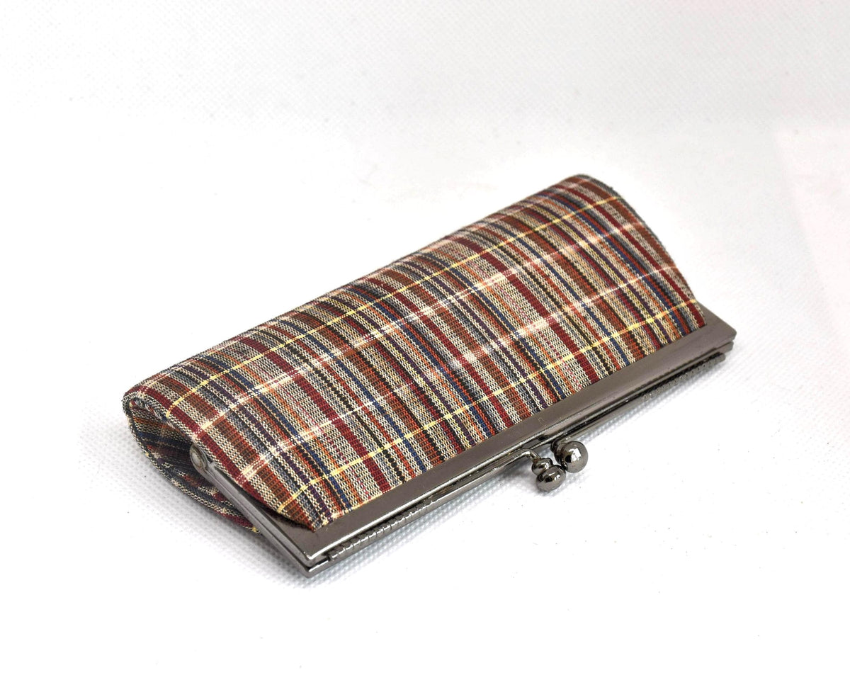 Ueda Tsumugi silk coin purse viewed from a high angle showing the striped pattern