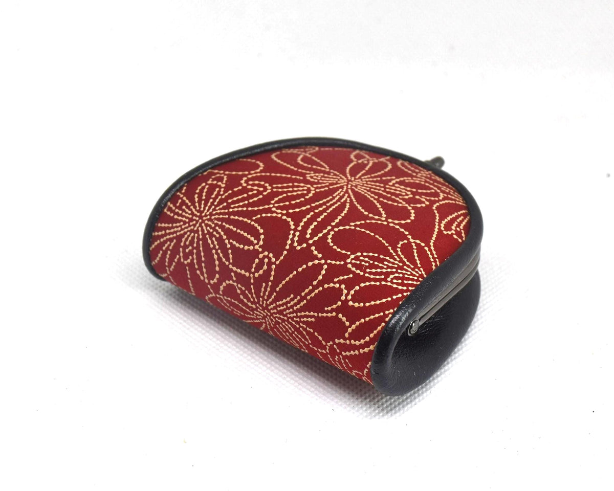 Inden deerskin coin purse side profile showcasing the slim folded deerskin gusset and clasp