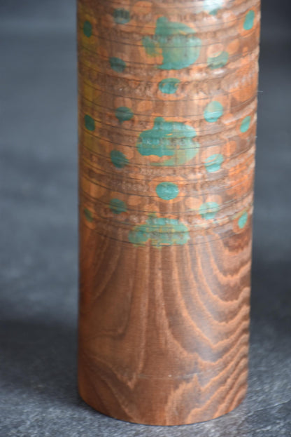 Miyajima Muhitsu kokeshi doll head top grain view