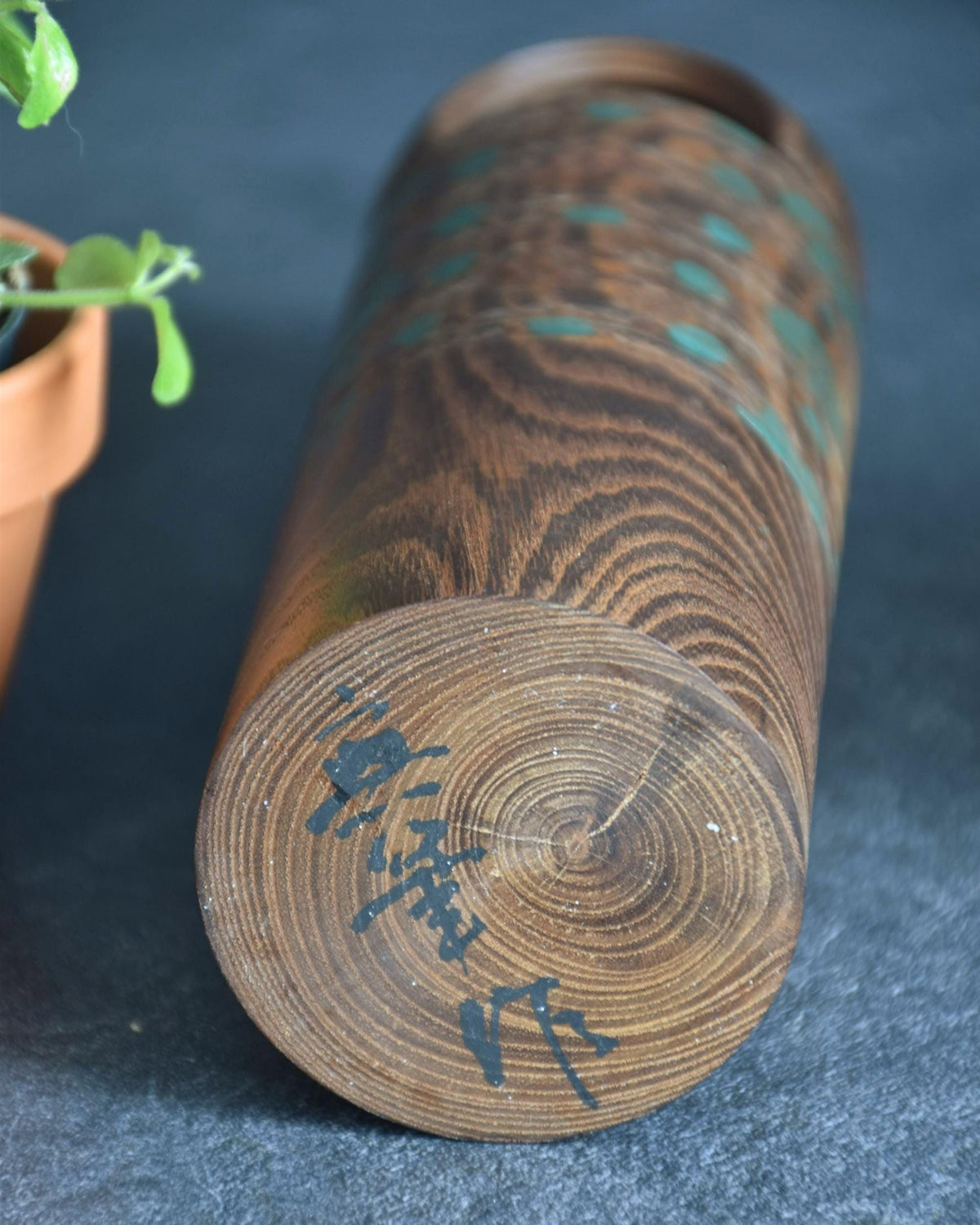 Miyajima Muhitsu kokeshi doll head detail with carved hair