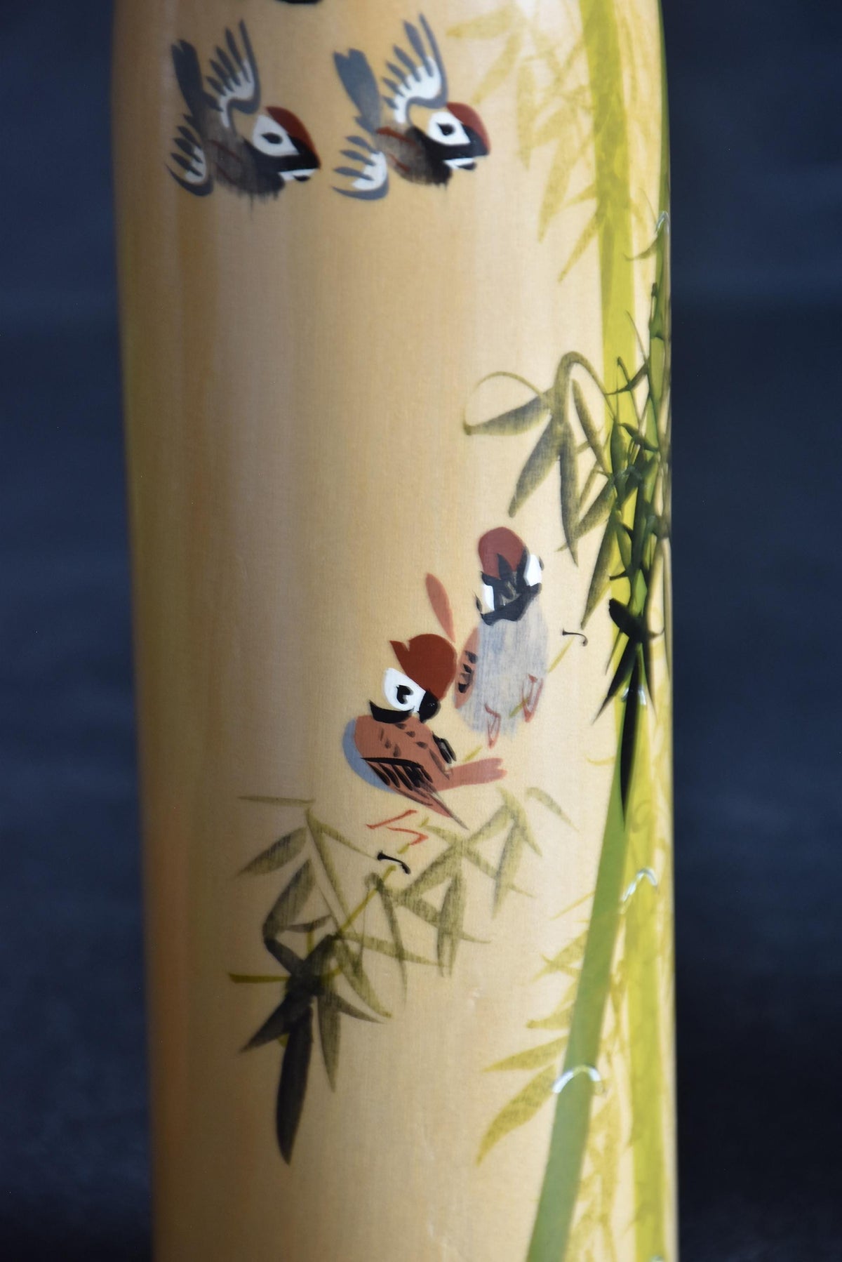 Japanese kokeshi dolls bamboo and floral motif body detail with hand-painted birds and bamboo