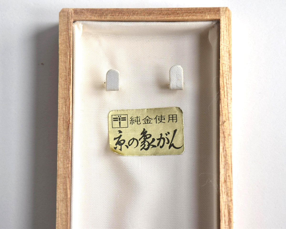 Japanese Zogan Floral Damascene Pendant Necklace shown inside its wooden storage box