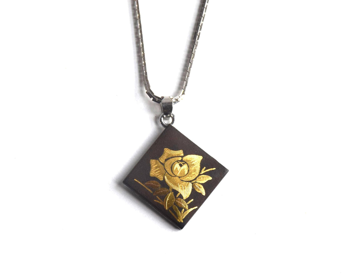 Japanese Zogan Floral Damascene Pendant Necklace presented against a white background