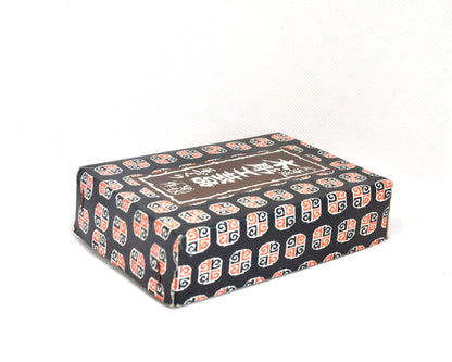 Ainu wooden coaster set showing closed original decorative packaging box