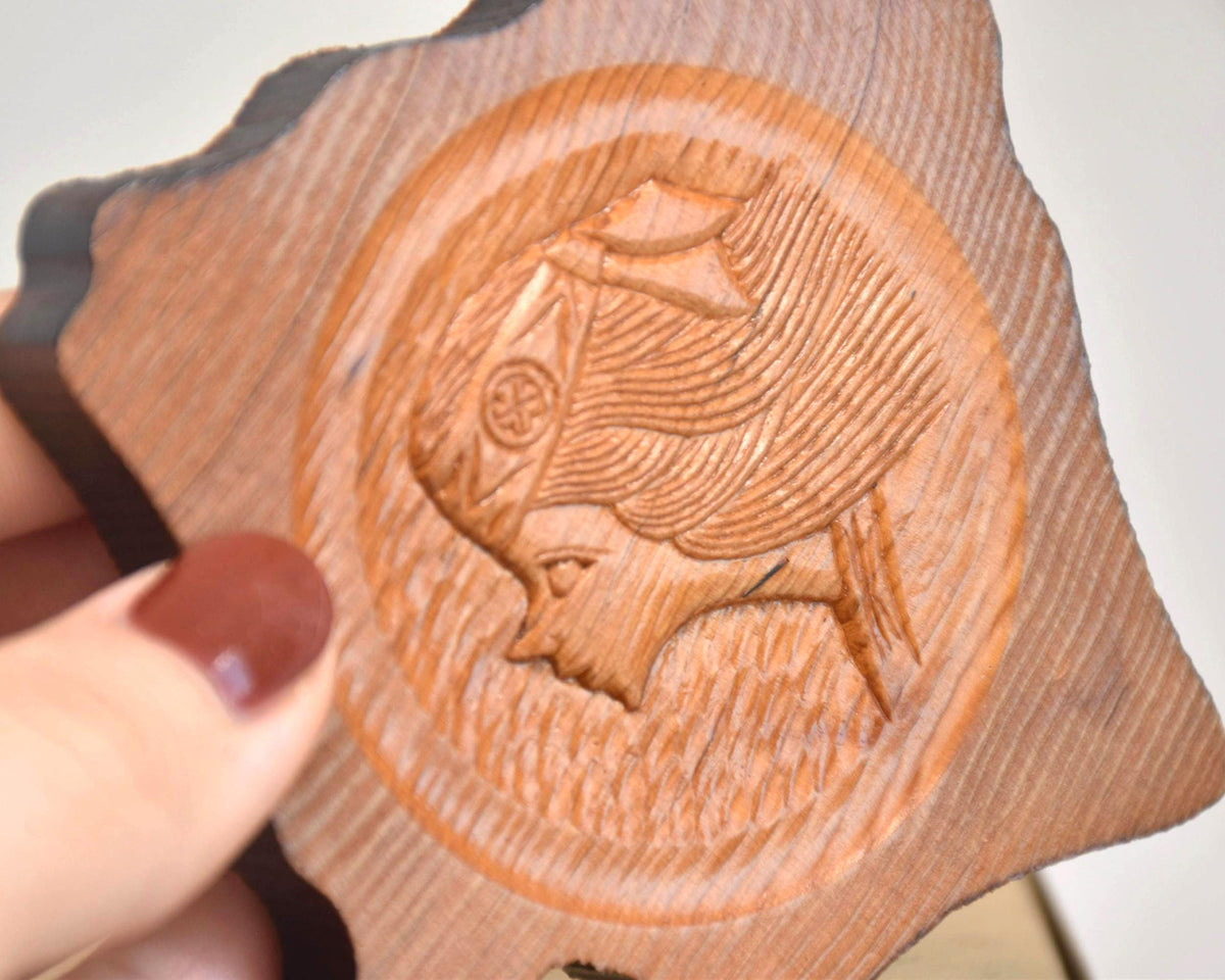 Ainu Hand-Carved Wooden Coaster Set Hokkaido Folk Art serving tray pattern detail held in hand
